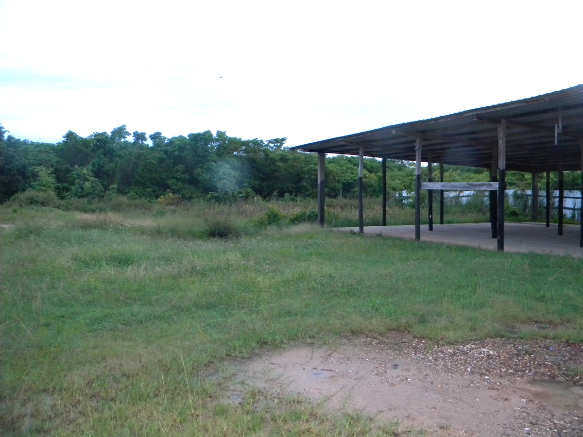 1.059 acres of land with Concrete Building in Belize City