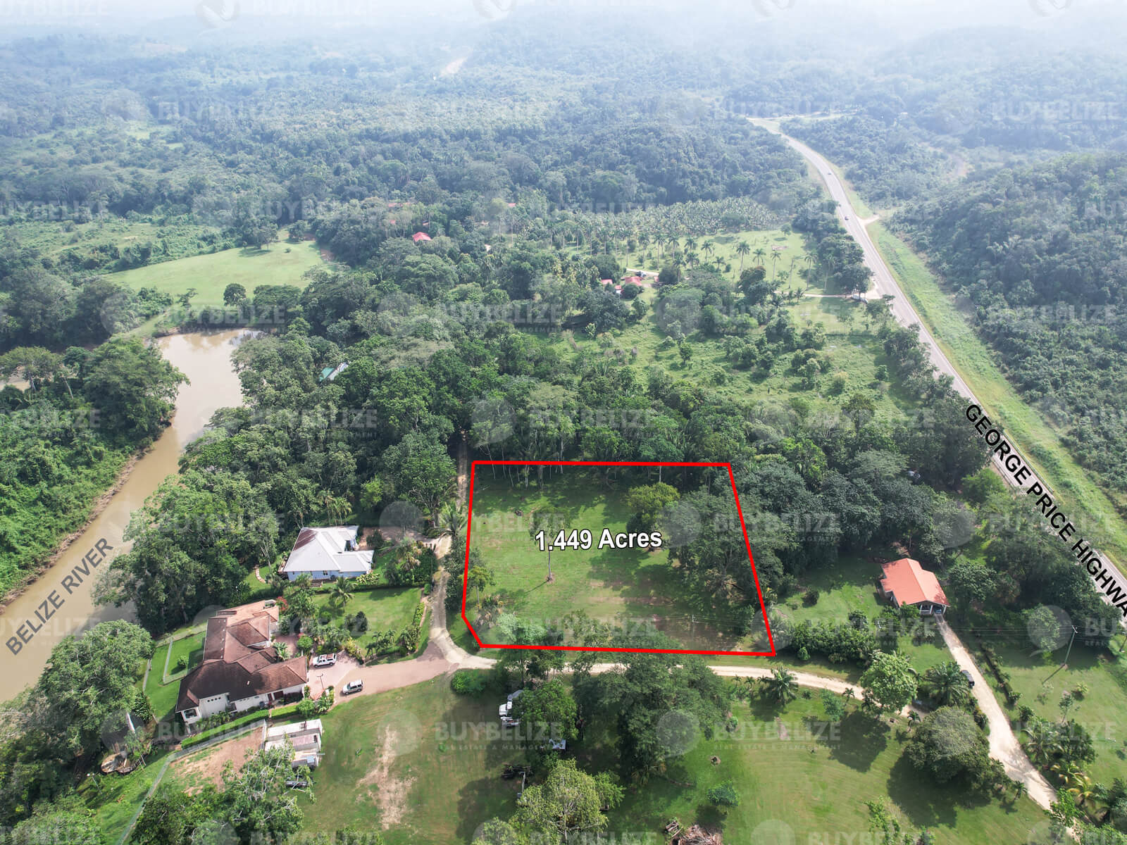 Beautifully landscaped 1.44 Acres in Cayo