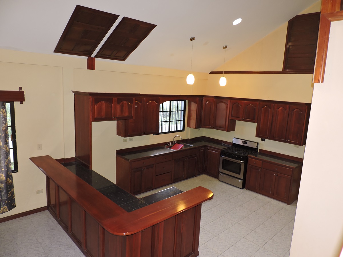Kitchen with High Top Ceiling