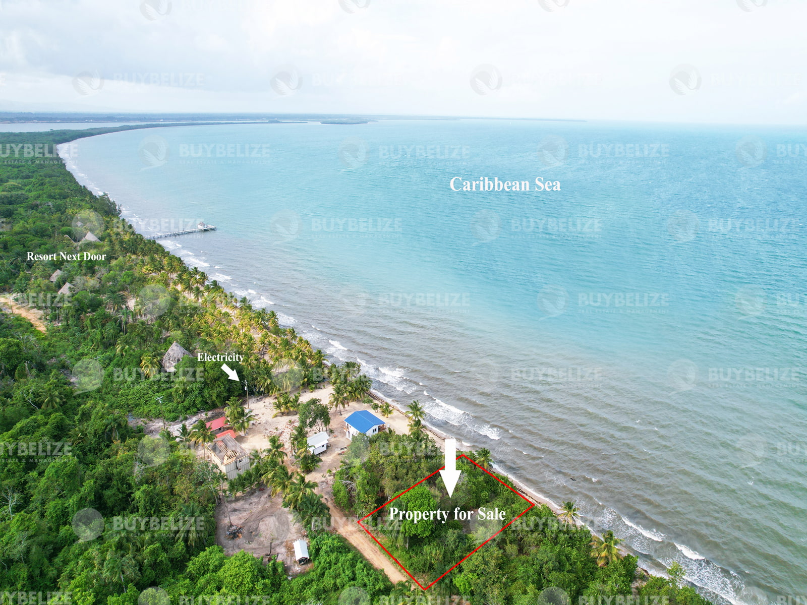 Sandy  Beach Lot Near Beautiful Resort in Southern Belize