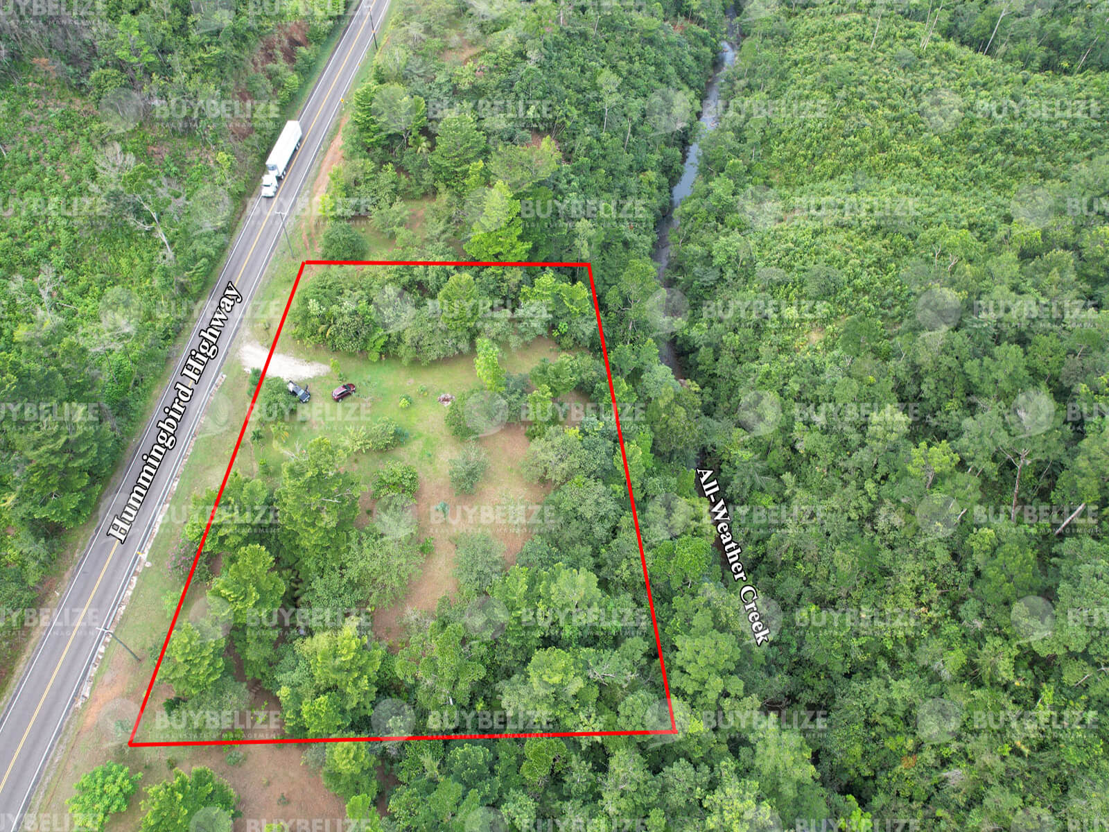 One of Kind One-Acre with Highway and Creek