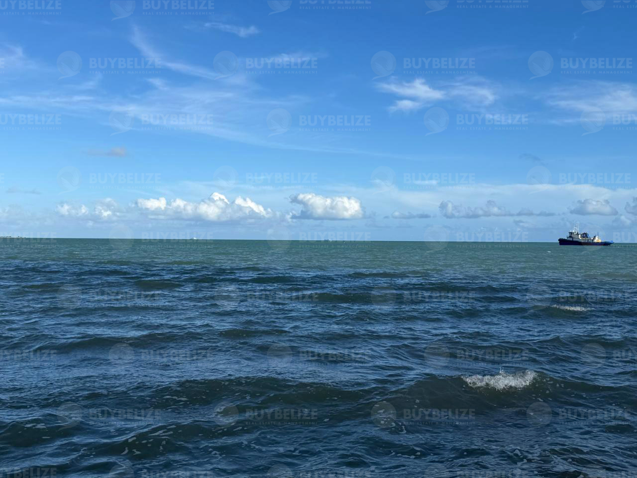Prime Waterfront Property with 100 Feet of Caribbean Sea Frontage – Minutes from Belize City